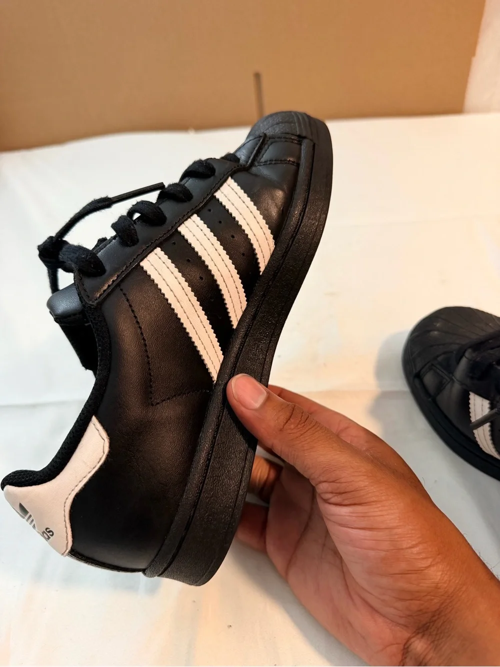 adidas Kids Black Sneakers with White Stripes and Gold Logo